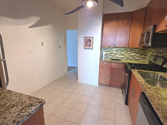 3rd image of 9001 Golf Rd APT 1B