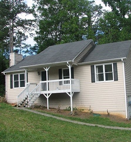 Ranch on full basement & drive under garage