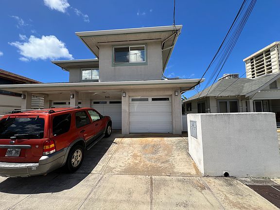 Front of house, driveway, mailboxes, enclosed garage (enters directly into home), also gate on outside to go to double entry doors.