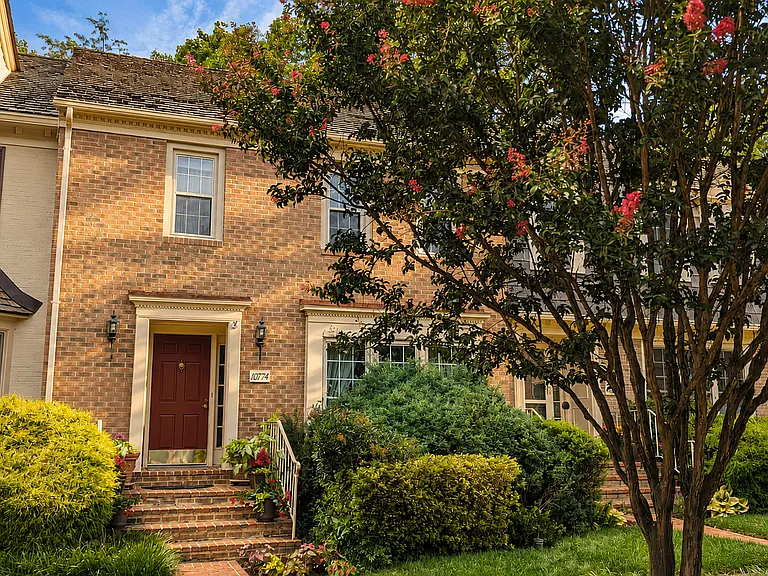 Brick townhome in award winning community. HOA maintains the landscaping, common areas and homes' bushes and gardens for a true lock-and-leave lifestyle.