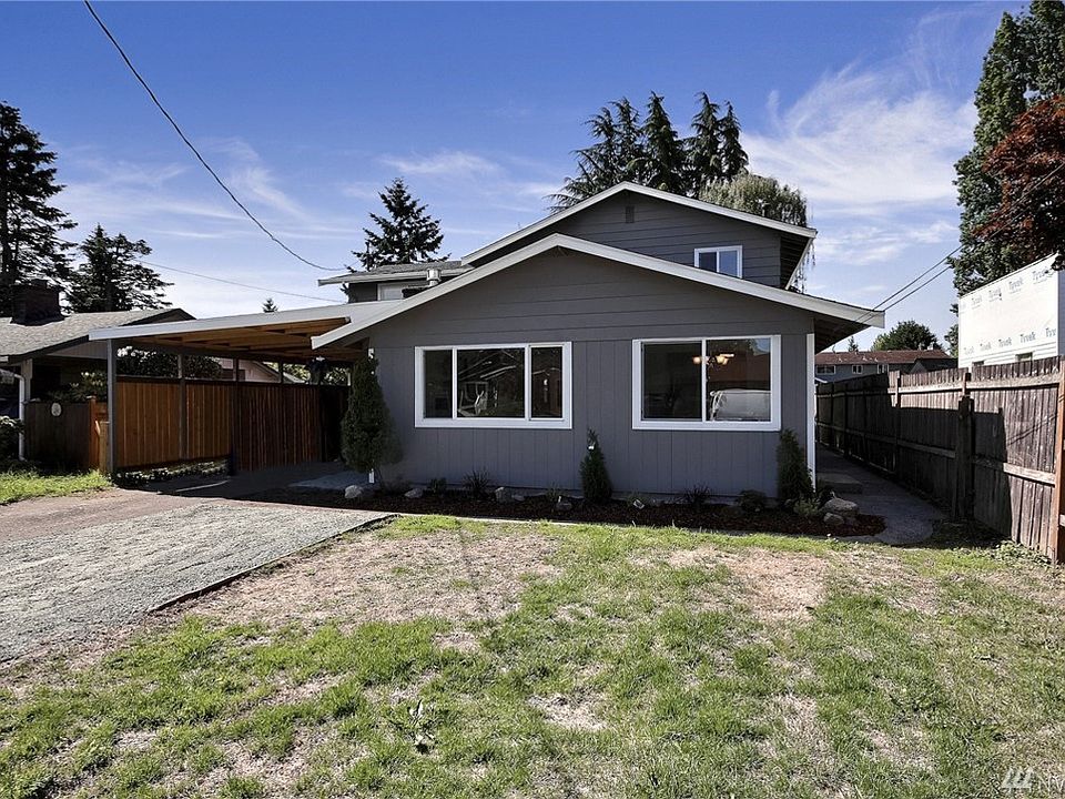 Amazing remodeled home. Enter to cozy living area w/ gas fireplace. New wood flooring on main. Across from living area is a second living space w/ views to oversized backyard. Expand living space outdoors onto lovely new deck. Mn flr also includes new kitchen with high end millwork and finishes. Lrge bedroom on frst flr w/ custom walk-in closet will delight. A full bath completes the mn floor. 4 bdrooms up with all new carpet & lighting. Full bath up w/ soaking tub and separate tiled shower.