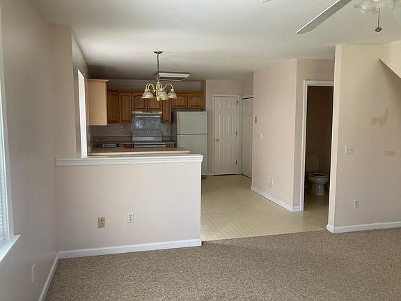 Main level, includes living room, dining area, 1/2 BA, coat closet, laundry area and kitchen