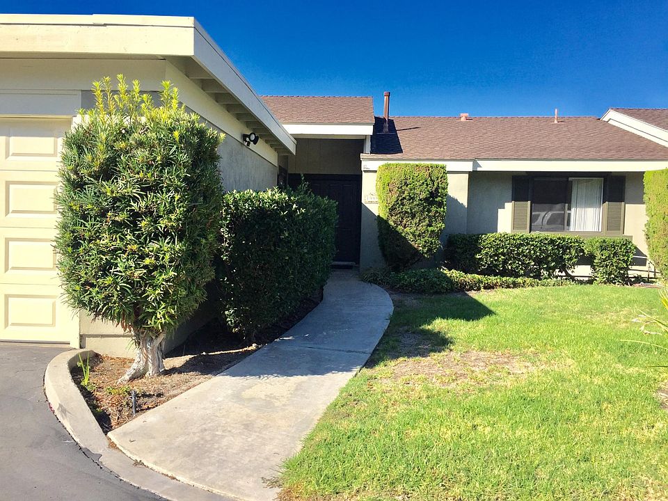 Path to front door. Garage on the left side