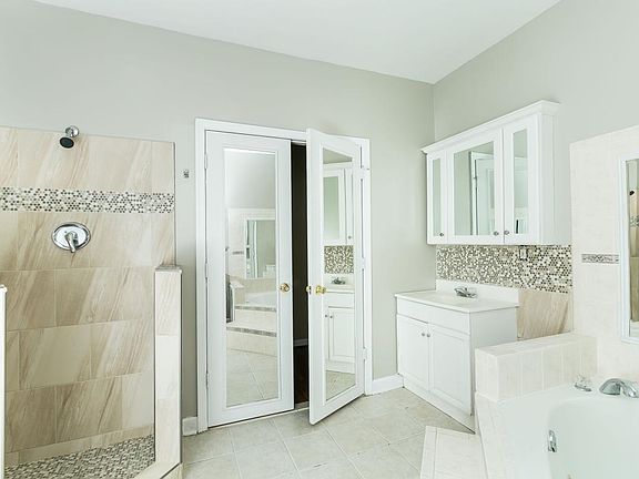 Ceramic Tiled Master Bathroom