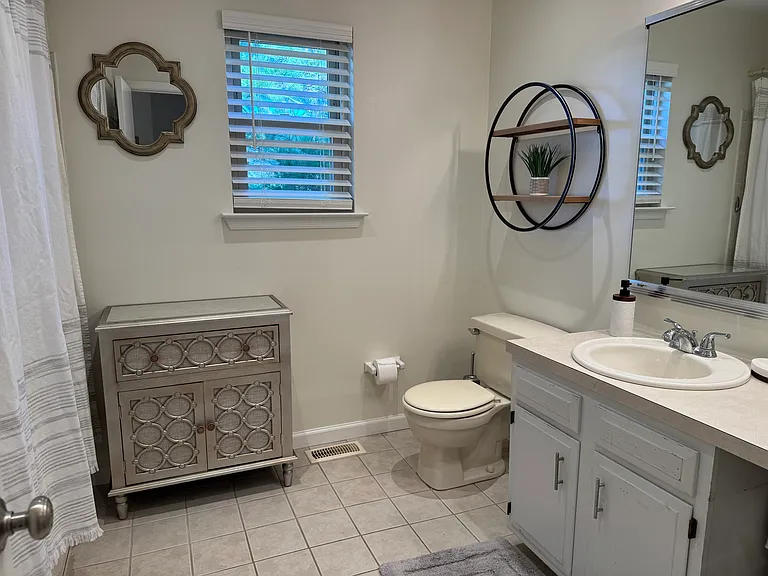 Full bathroom upstairs hallway for three bedrooms. The 4th bedroom (master) has its own bathroom. Lots of closet space in both full bathrooms.