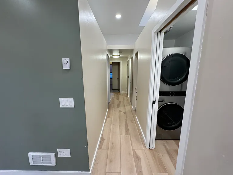 Hallway from kitchen to bedrooms and bathroom