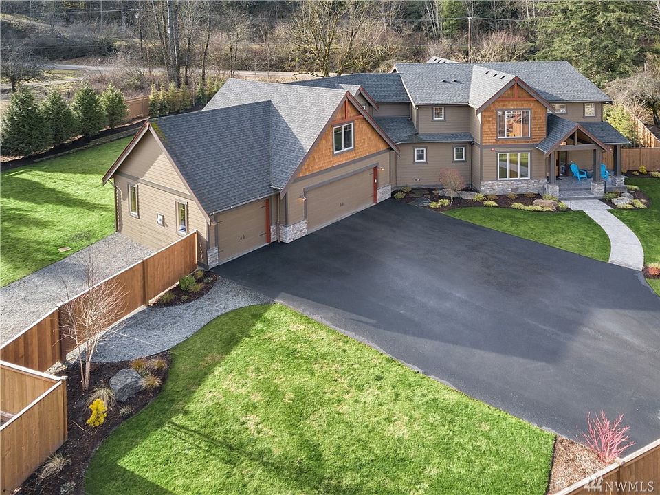 3330 SqFt 2-Story on .547 acres! 3 beds (vaulted bonus room w/closet provides 4th bedroom option), Den, Great Room (gourmet kitchen w/eating space, dining area, family room - opens to the exquisite outdoor living area).  BIG 3 car garage, R/V or boat parking, long driveway.  A lot of custom landscaping...