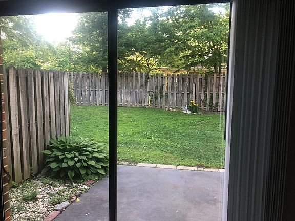 This is the view from a neighboring unit in summer, This will help you see how the view from your kitchen will look like.