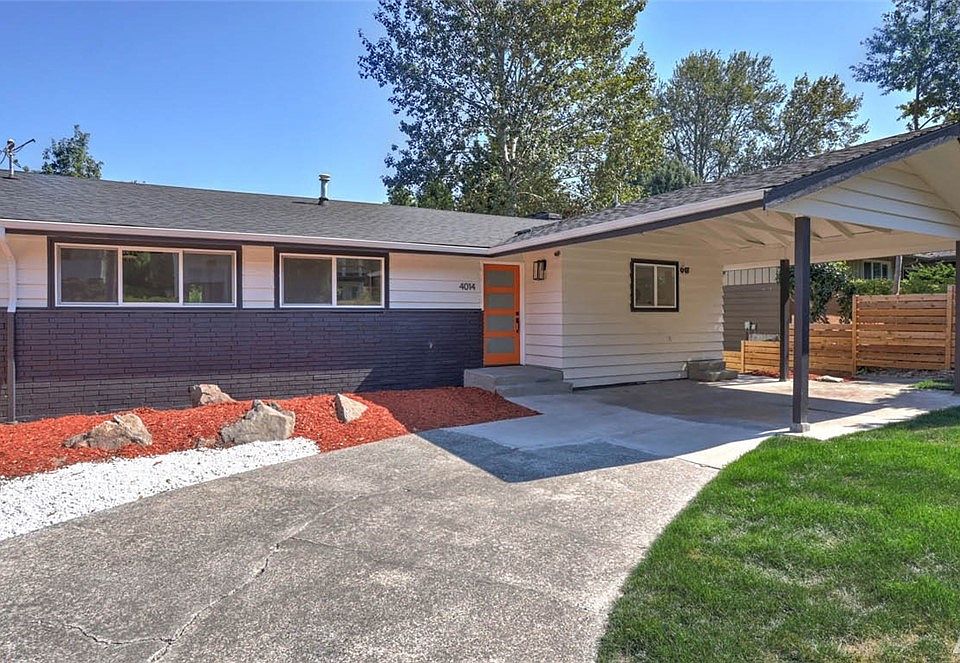 Welcome home to your urban oasis!! Beautifully-remodeled home on a quiet street adjacent to Cheasty Greenspace. 