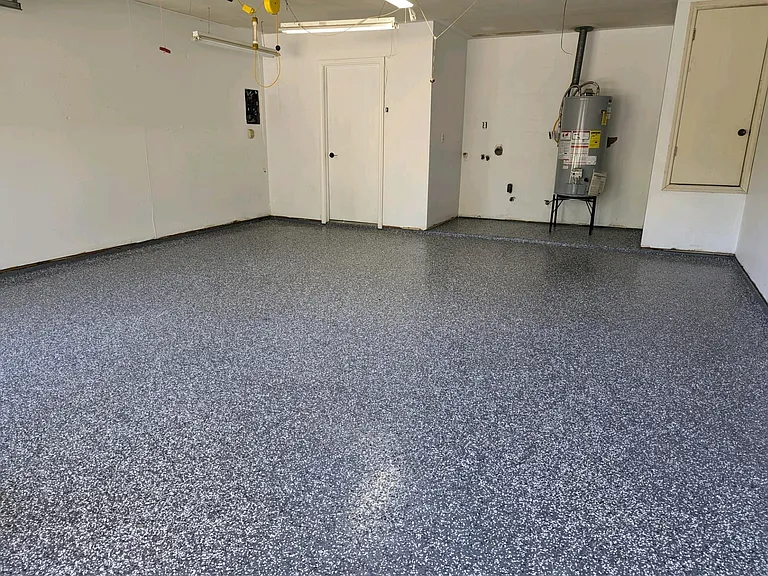 garage, new water heater, washer/dryer hookups and new epoxy floor