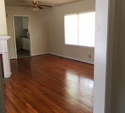 beautiful hardwood floors in living area and throughout home