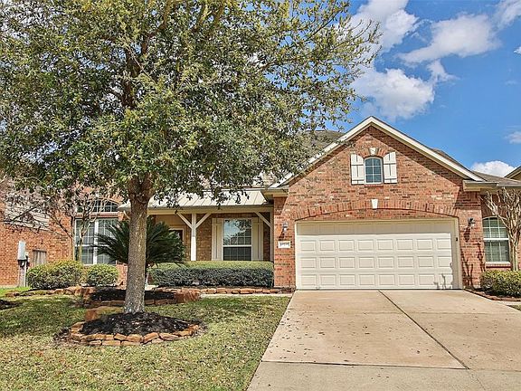 Situated on a quiet cul-de-sac, this brick two story has a porch that brings such a charm to this beautiful property. Extra nice is having a 2.5 car garage to store items away from the vehicles.