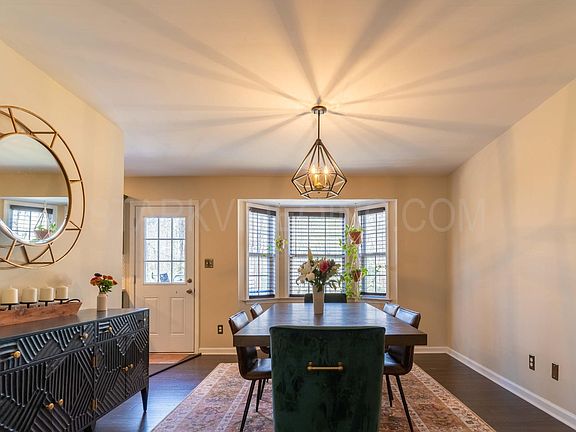 Dining Room featuring a bay window.