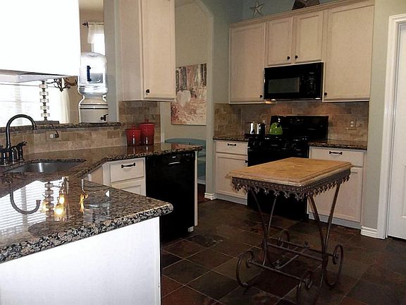 Kitchen has Slate Flooring and Lots of Cabinets and Countertop Space * Plenty of Room to Add Your Ow