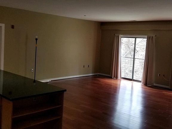 Large open kitchen and living area with double sliding doors and tons of natural light.