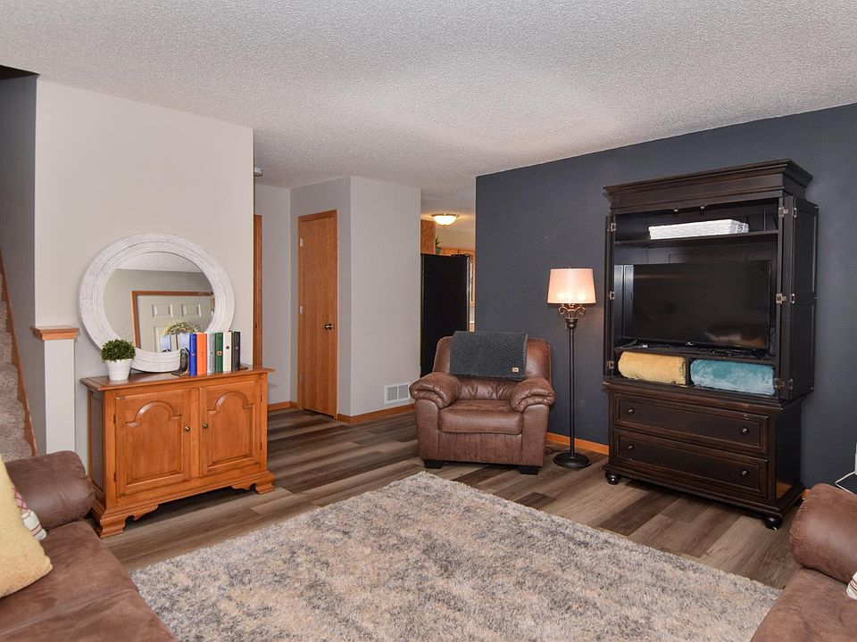 Doors you see in this picture are a coat closet, mechanical room (with storage) and behind the mirror wall is the 1/2 bath.