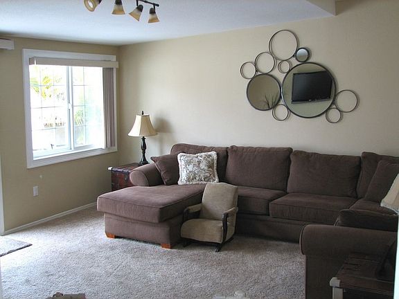 Large family room overlooks back patio.