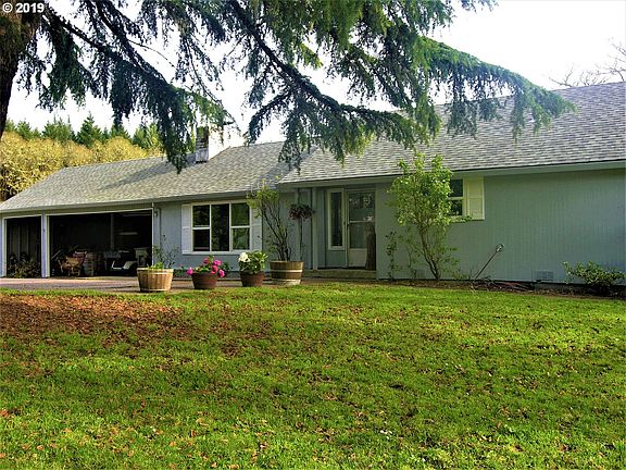 2nd image of 14025 NW Meadow Lake Rd