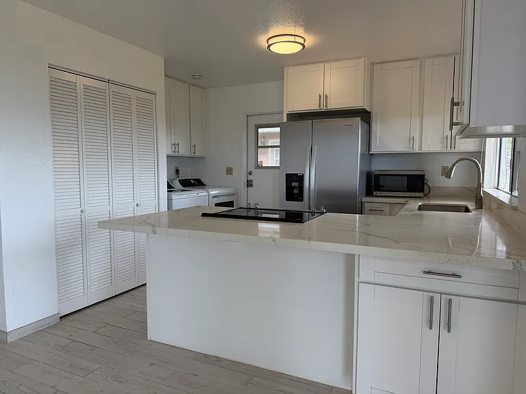 Recently updated, open kitchen, thoughtful storage options.