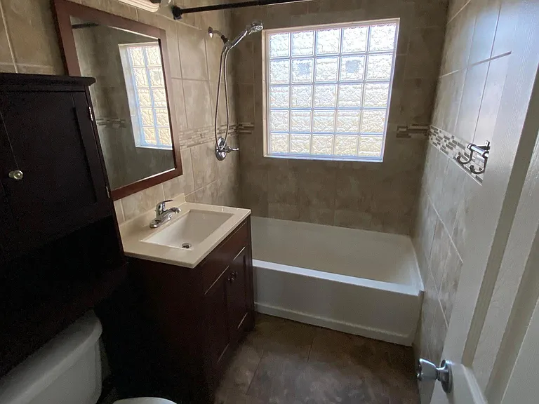 Fully Tiled Bathroom