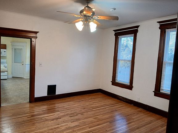Lovely dining room all hardwood floors, natural light ceiling fan