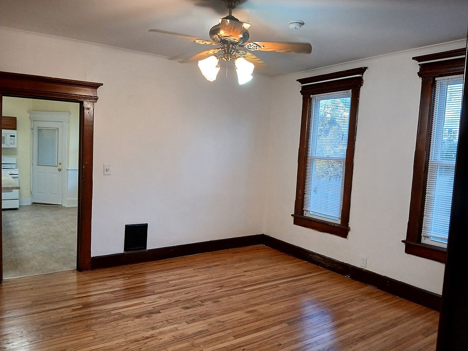 Lovely dining room all hardwood floors, natural light ceiling fan