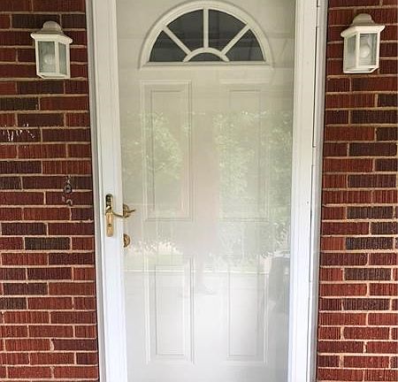 Newer front and back doors with full view storm doors.