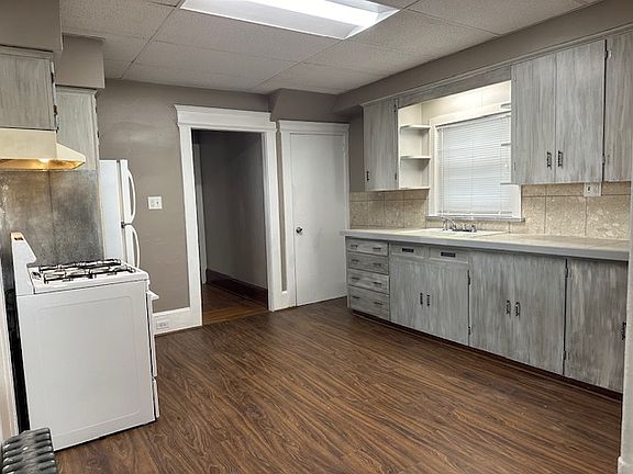 Kitchen with access to basement