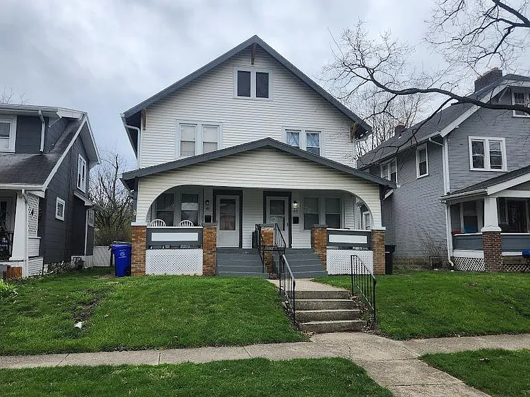 Street view of front yard, sidewalk. Unit 43 is on the right