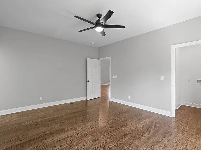 Primary Bedroom with in-room laundry room
