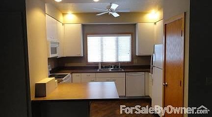 Bright Kitchen-Big Pantry
						:
						Well lighted kitchen with Good Counter Space.