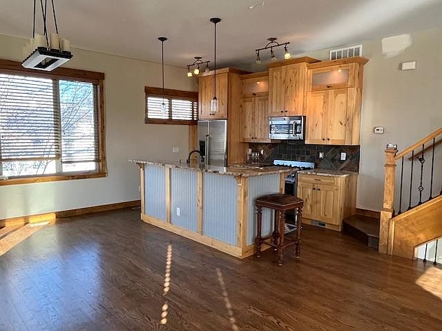 High end appliances, double oven and 5 burner stove