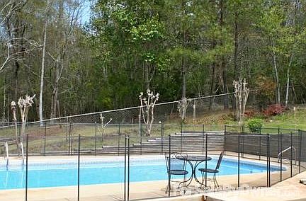 Backyard is completely fenced in