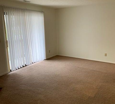 Living room- sliding glass door on to balcony