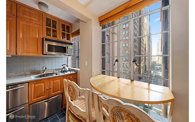 Sold by Douglas Elliman | media 10