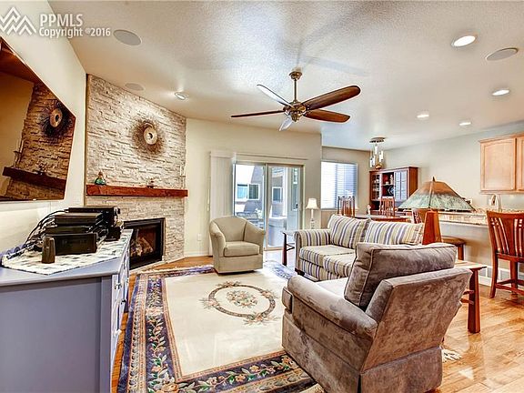 Great room w/floor to ceiling stone gas fireplace.