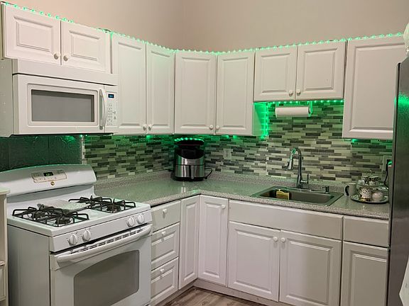 Renovated kitchen with under-cabinet lights