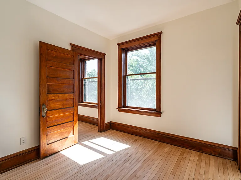 Master bedroom. Walk-in closet door is at right.