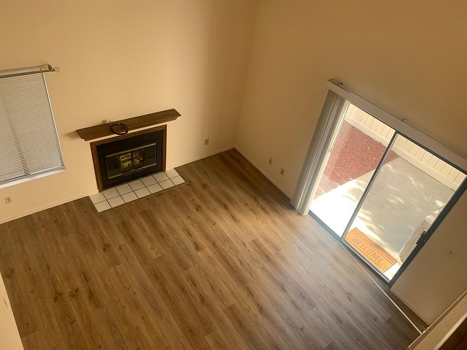 Living area with wood burning fireplace