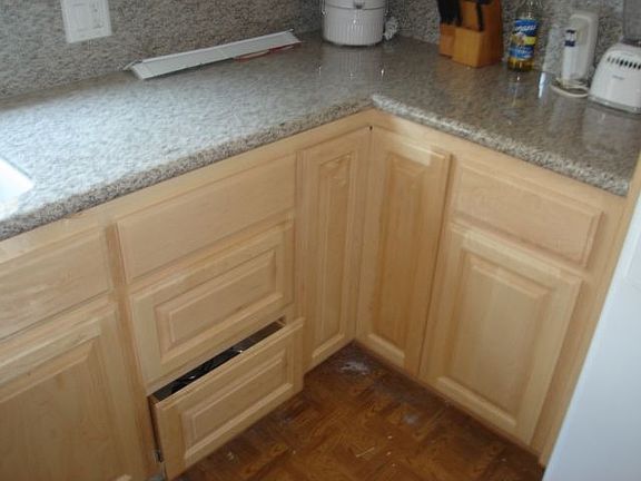 All new custom made maple cabinets with granite countertops