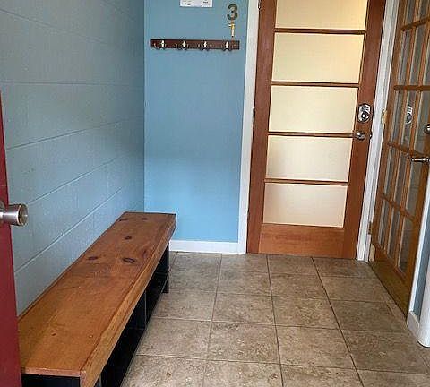 Shared foyer entrance with upstairs unit