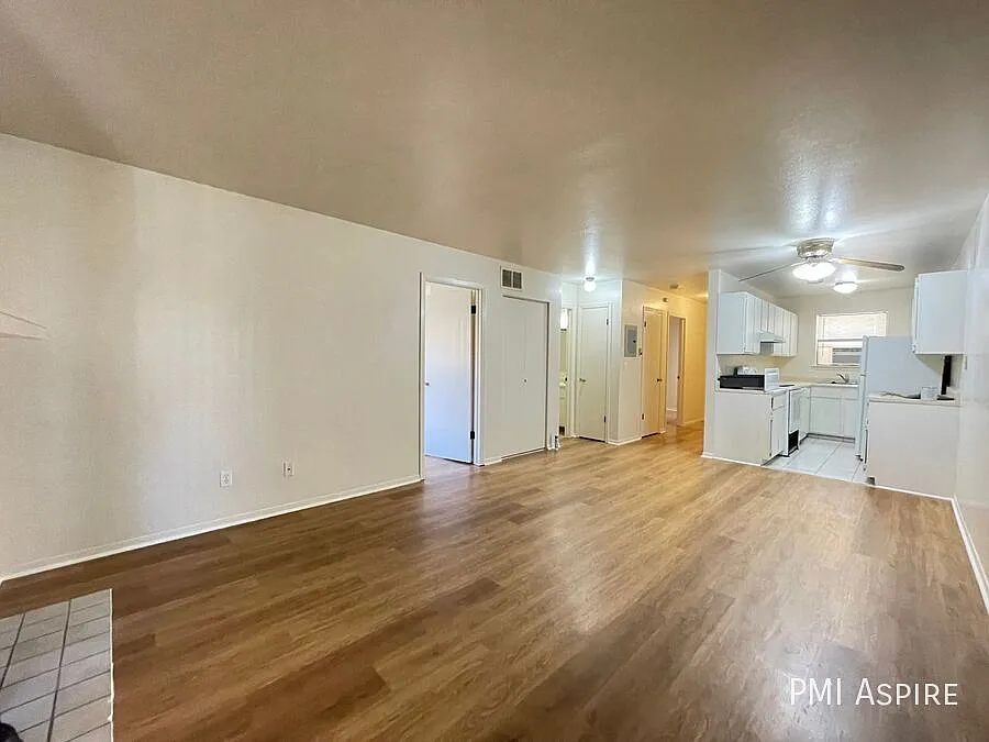 "Charming 2-Bed Retreat with Cozy Fireplace in Longmont Your Perfect 784 Sq Ft Haven!" — Photo 3