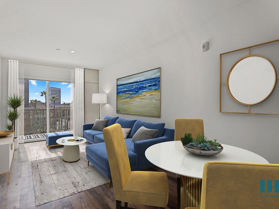 Open-Concept Dining and Living Room with Patio
