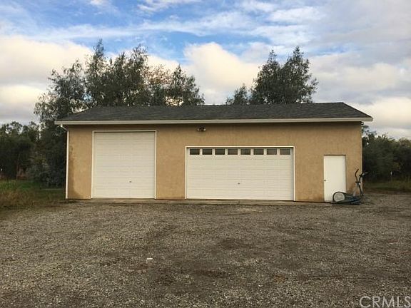 Shop behind the house.  Completely finished