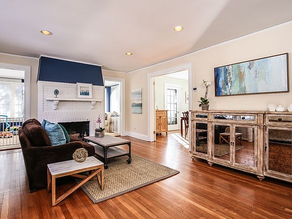 Living room with wood-burning fireplace