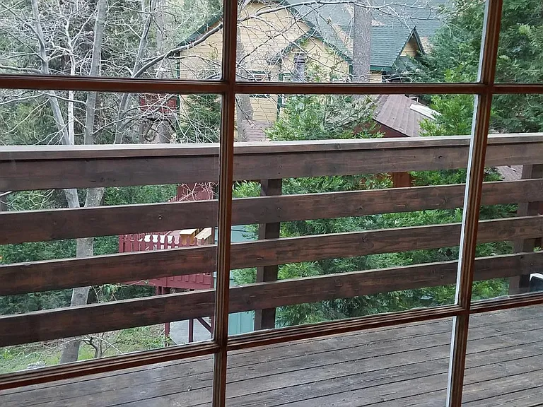 very big window with panoramic nature view overlooking balco