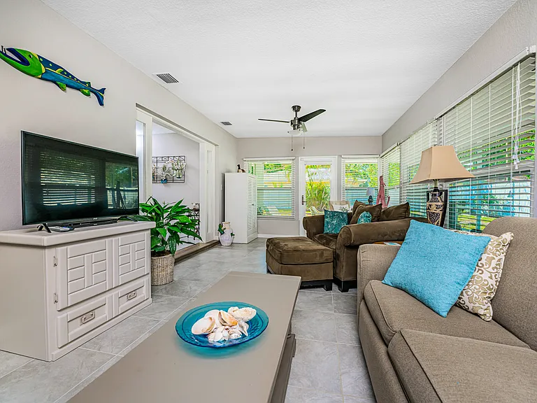 open family room with coffee bar pass through from the kitchen. Overlooks the private backyard