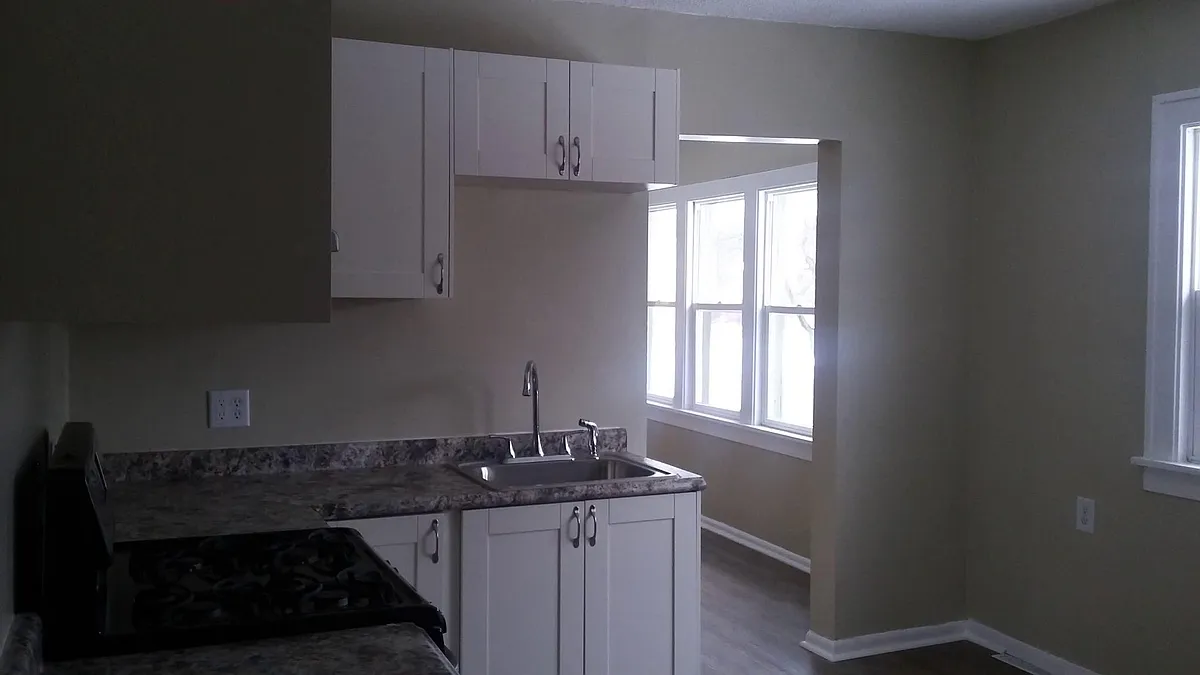 View into living room area from kitchen - Irving Ave N