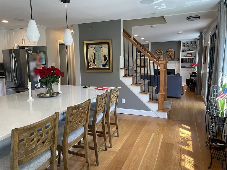 Kitchen renovated in 2020. The four bar chairs are provided.