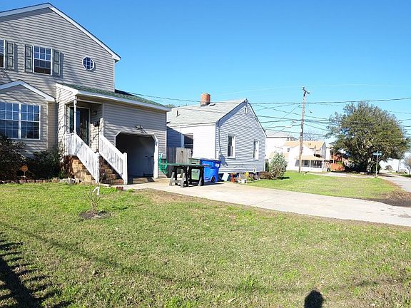 large front yard and only one block from public beach access